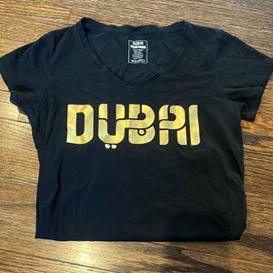T-shirt with gold writing